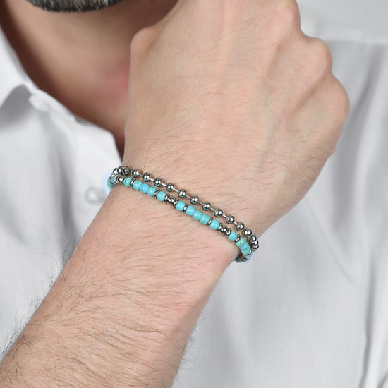 BRACELET HOMME EN ACIER AVEC PIERRES TURQUOISES ET ÉLÉMENTS EN ACIER