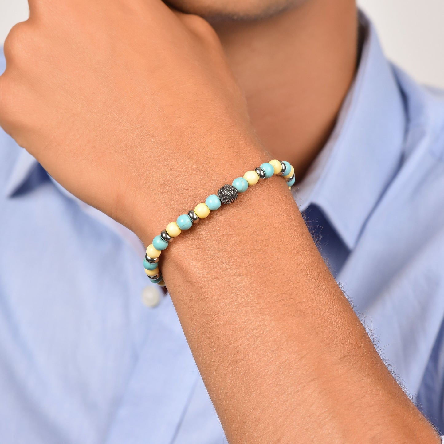 BRACELET ÉLASTIQUE POUR HOMME AVEC PIERRES TURQUOISES ET JAUNES ET ÉLÉMENTS EN ACIER