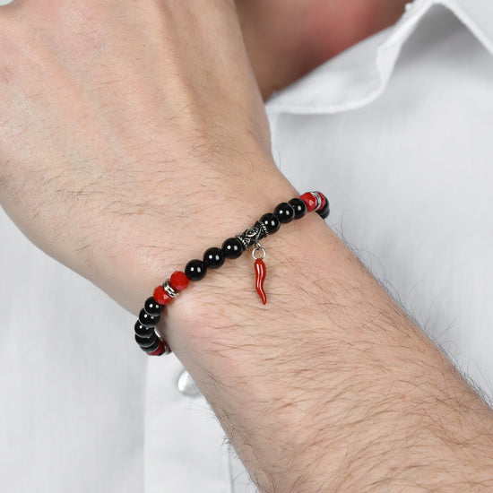 BRACELET ÉLASTIQUE POUR HOMME AVEC PIERRES NOIRES ET ROUGES ET CORNE ROUGE