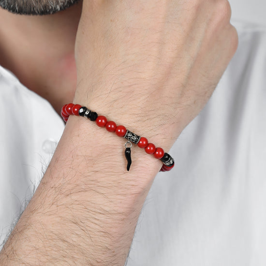 BRACELET ÉLASTIQUE POUR HOMME AVEC PIERRES ROUGES ET NOIRES ET CORNE NOIRE