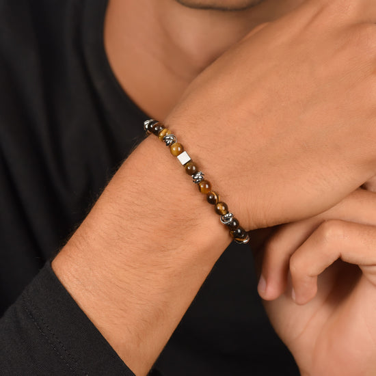 BRACELET HOMME EN ACIER AVEC PIERRES EN OEIL DE TIGRE ET ÉLÉMENTS EN ACIER