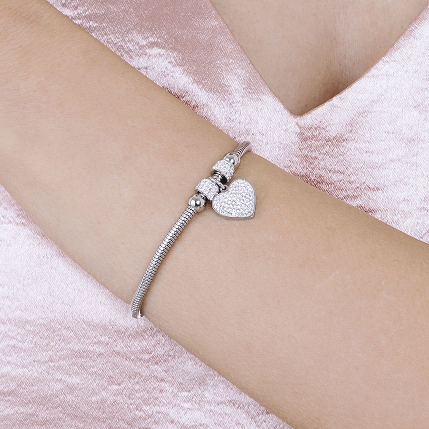 BRACELET POUR FEMME EN ACIER AVEC CŒUR ET CRISTAUX BLANCS