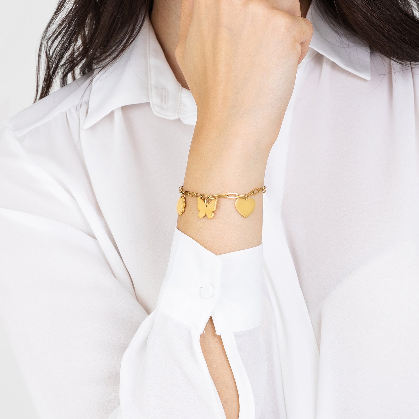 BRACELET POUR FEMME EN ACIER PLAQUÉ OR AVEC CŒUR, PAPILLON ET TRÈFLE À QUATRE FEUILLES