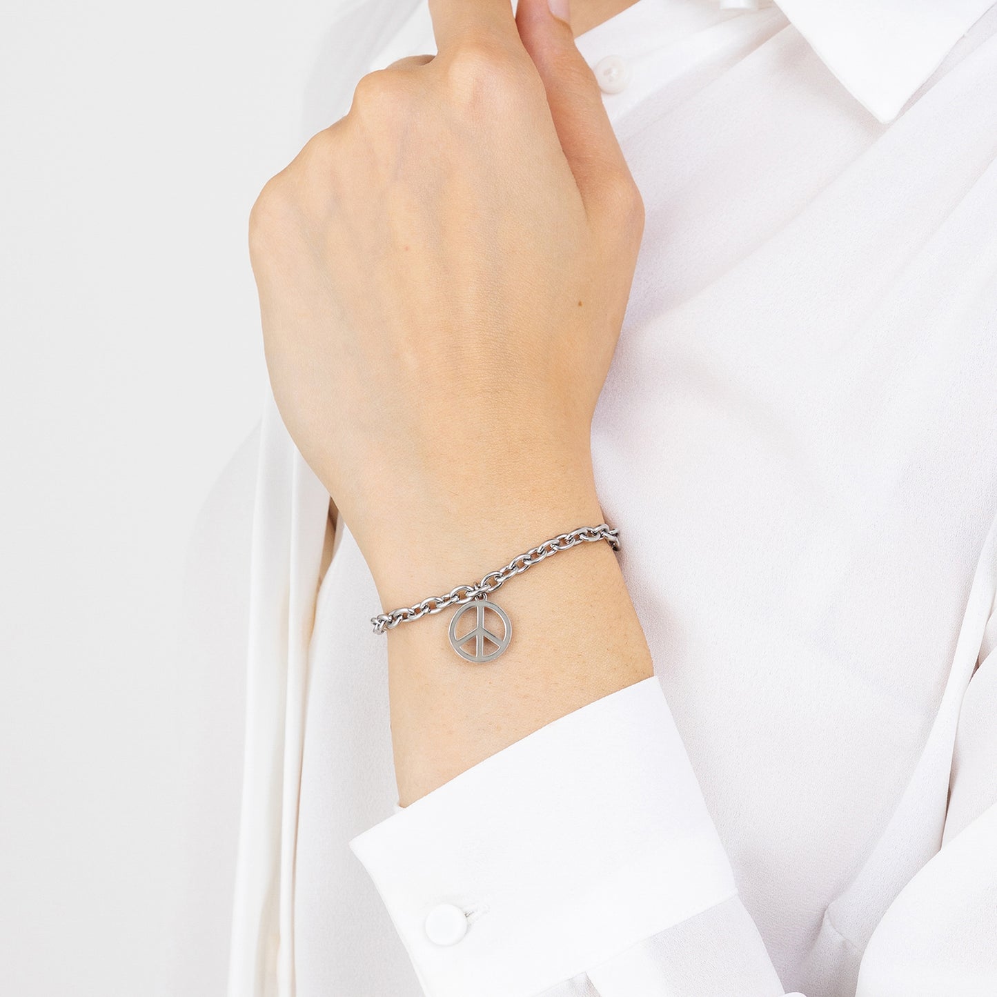 BRACELET EN ACIER POUR FEMMES AVEC SYMBOLE DE LA PAIX