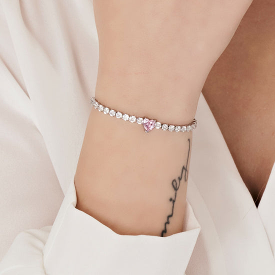 BRACCIALE DONNA IN ACCIAIO CON CRISTALLI BIANCHI E CUORE CRISTALLO ROSA