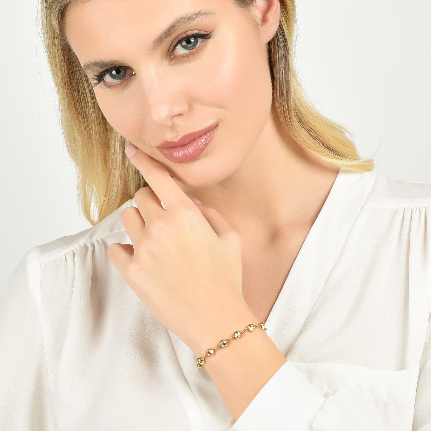 BRACELET POUR FEMME EN ACIER ET OR IP AVEC CRISTAUX BLANCS