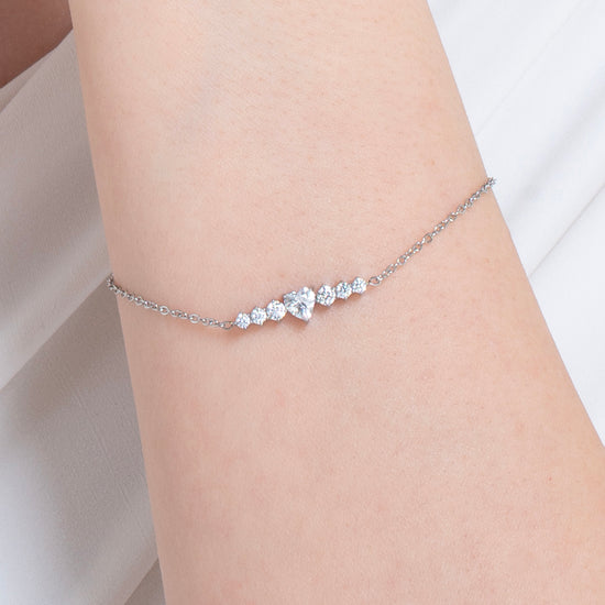 BRACELET POUR FEMME EN ACIER AVEC CŒUR ET CRISTAUX BLANCS