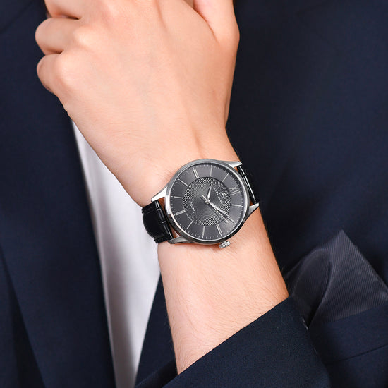 MONTRE EN ACIER POUR HOMMES AVEC BRACELET EN CUIR NOIR