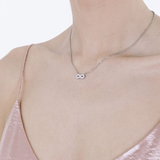 COLLIER EN ACIER POUR FEMMES AVEC INFINI ET CRISTAUX BLANCS