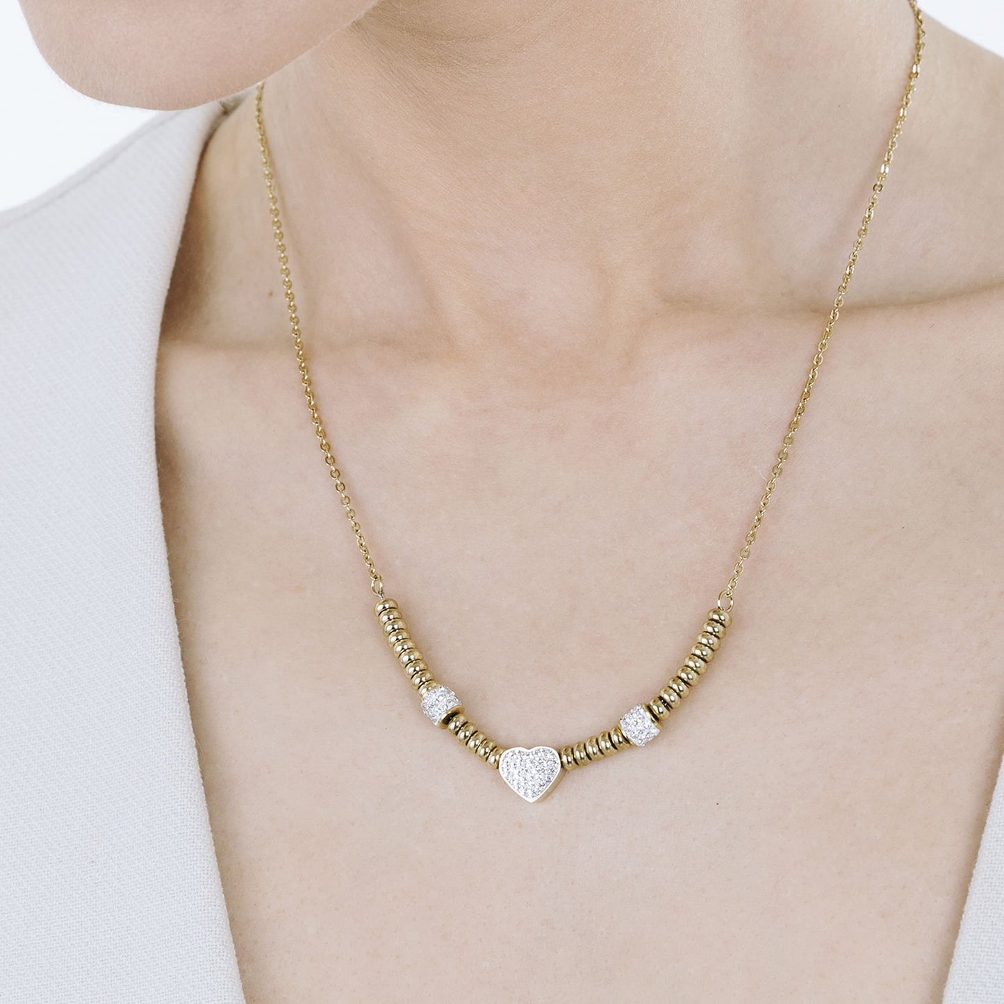 COLLIER EN ACIER DORÉ IP AVEC CŒUR EN CRISTAL BLANC