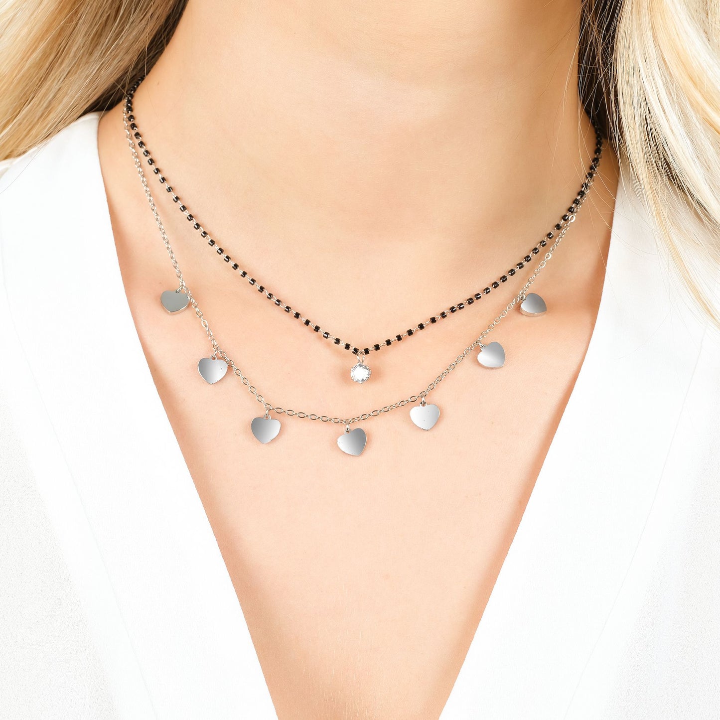 COLLIER EN ACIER POUR DAMES AVEC CŒURS, ÉLÉMENTS IP NOIRS ET CRISTAL BLANC