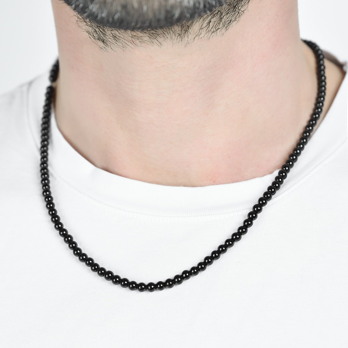 COLLIER EN ACIER POUR HOMME AVEC PERLES NOIRES