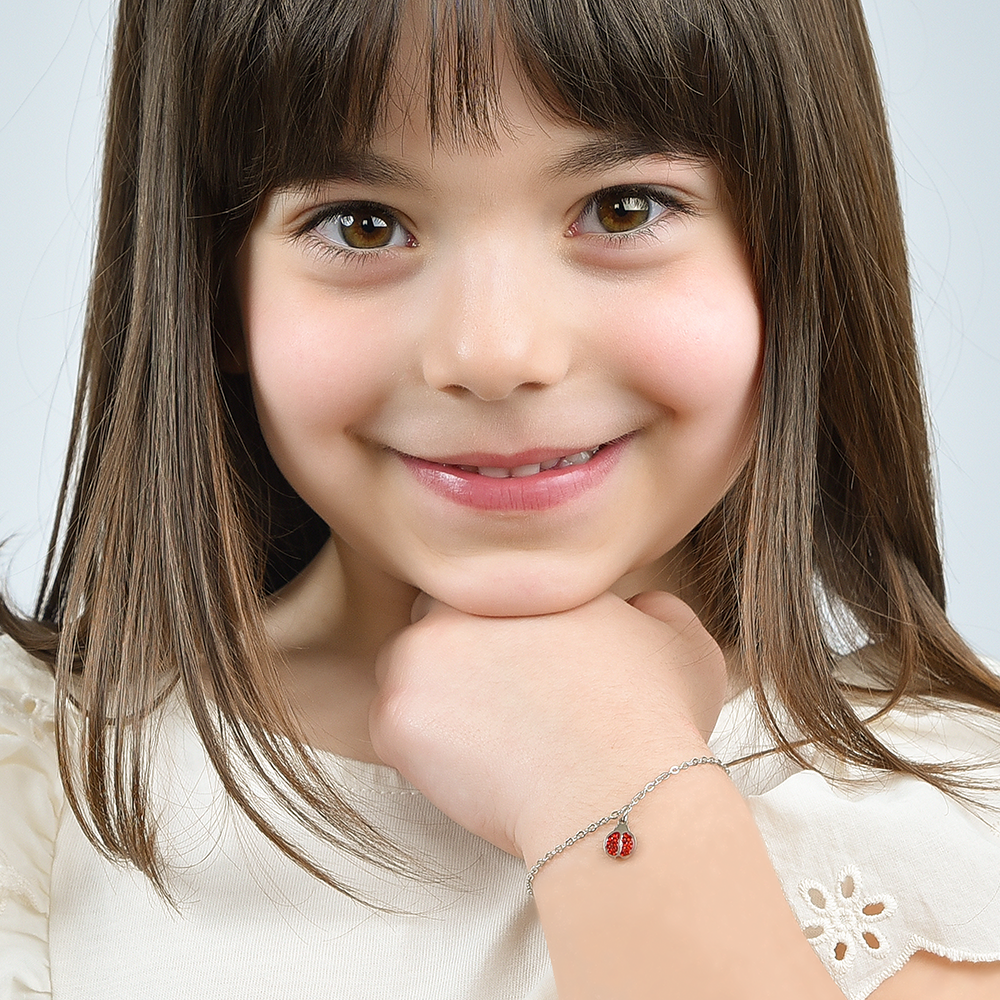 BRACELET FILLE EN ACIER AVEC COCCINELLE ET CRISTAUX ROUGES