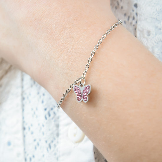 BRACELET FILLE EN ACIER AVEC PAPILLON ET CRISTAUX ROSES