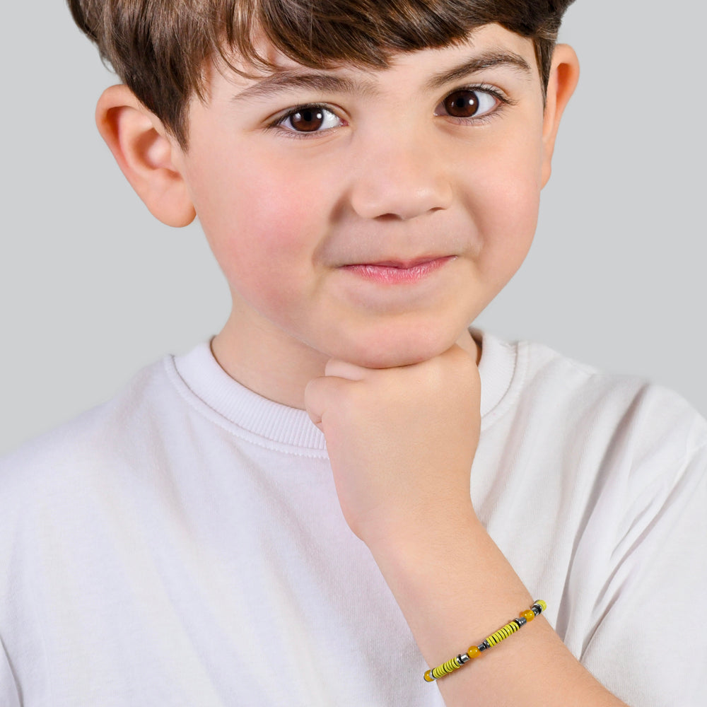 BRACELET FILLE EN ACIER AVEC PIERRES JAUNES ET ÉLÉMENTS EN ÉMAIL JAUNE