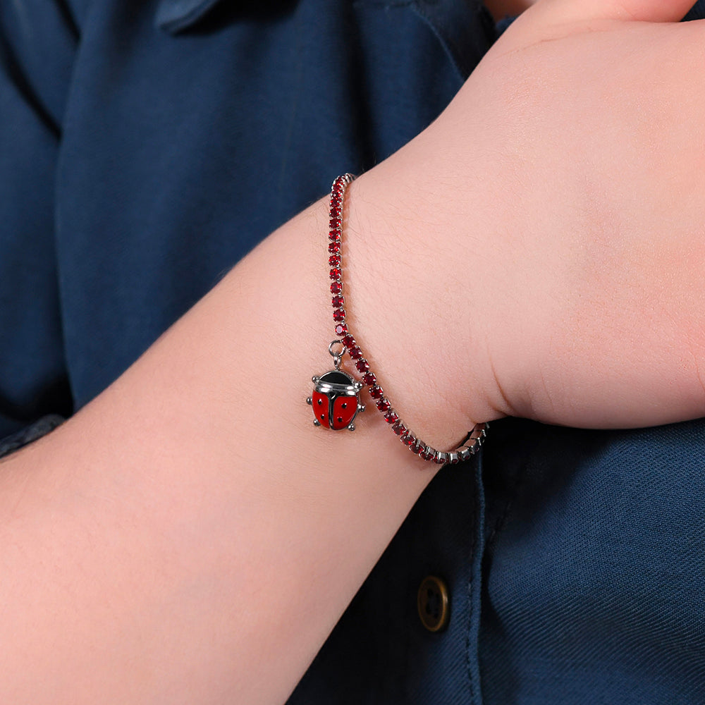 BRACELET DE TENNIS EN ACIER POUR FILLE AVEC CRISTAUX ROUGES ET COCCINELLE