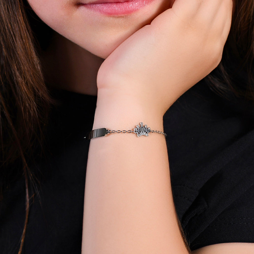 BRACELET FILLE EN ACIER AVEC PLAQUE ET COURONNE AVEC CRISTAUX BLANCS