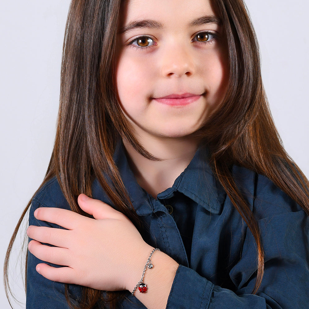 BRACELET FILLE EN ACIER AVEC COCCINELLE EN ÉMAIL ROUGE ET NOIR ET CRISTAL