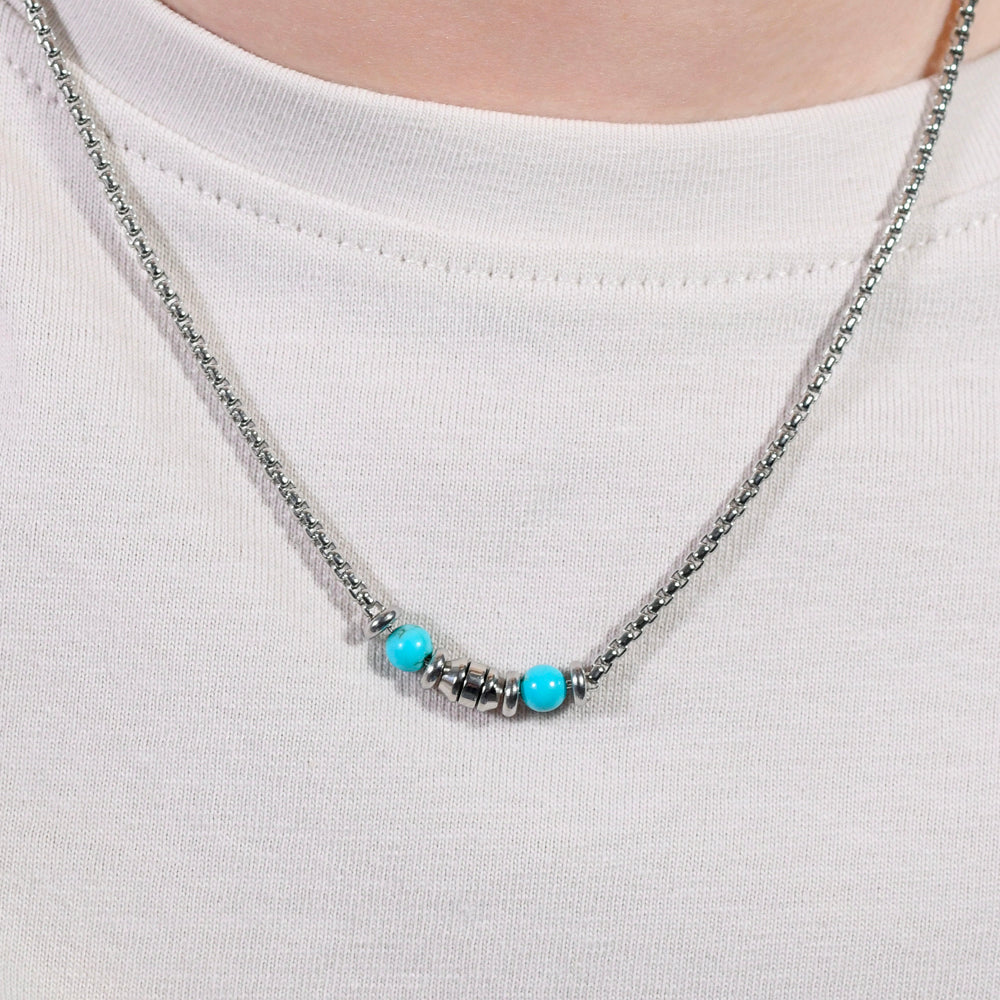 COLLIER BÉBÉ EN ACIER AVEC PIERRES TURQUOISES