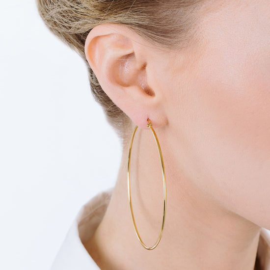 BOUCLES D'OREILLES CERCLÉES EN ACIER DE 63 MM DE DIAMÈTRE POUR FEMMES